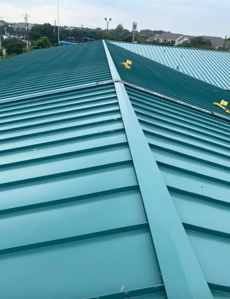 Green commercial metal roof ridge and valley for Metal Roof Repair in Arvada